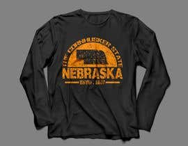 #227 dla Create a &quot;Nebraska&quot; T-shirt from my example layout/mockup.  Make it awesome! przez shahenalambd