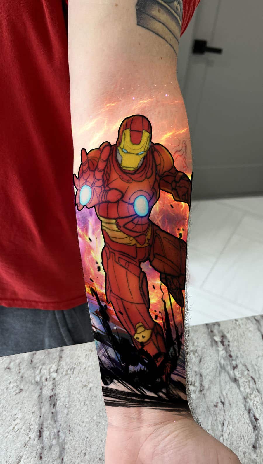
                                                                                                                        Contest Entry #                                            20
                                         for                                             Add color to my photo for my tattoo- Iron Man & Astronaut
                                        