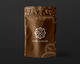 a bag of kopi luwak coffee on a black background