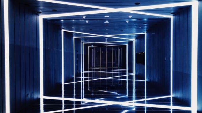 office corridor with criss-crossing led lights